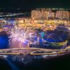 entire scene firework kiss of the sea and kiss bridge at sunset town