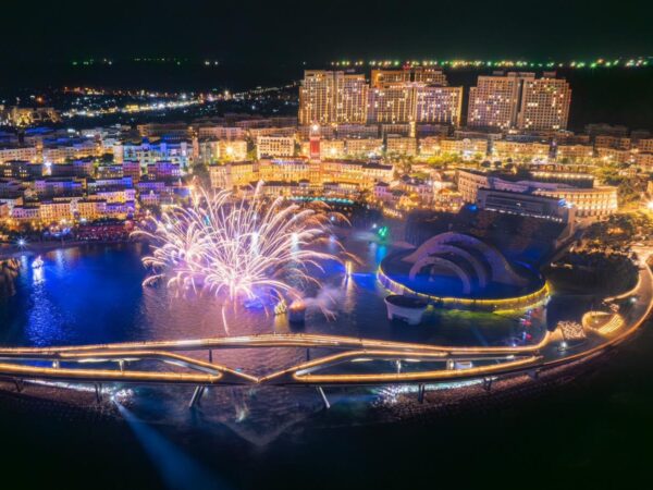 entire scene firework kiss of the sea and kiss bridge at sunset town