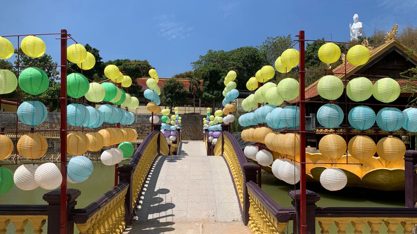 A bridge is decorated with colourful lantern