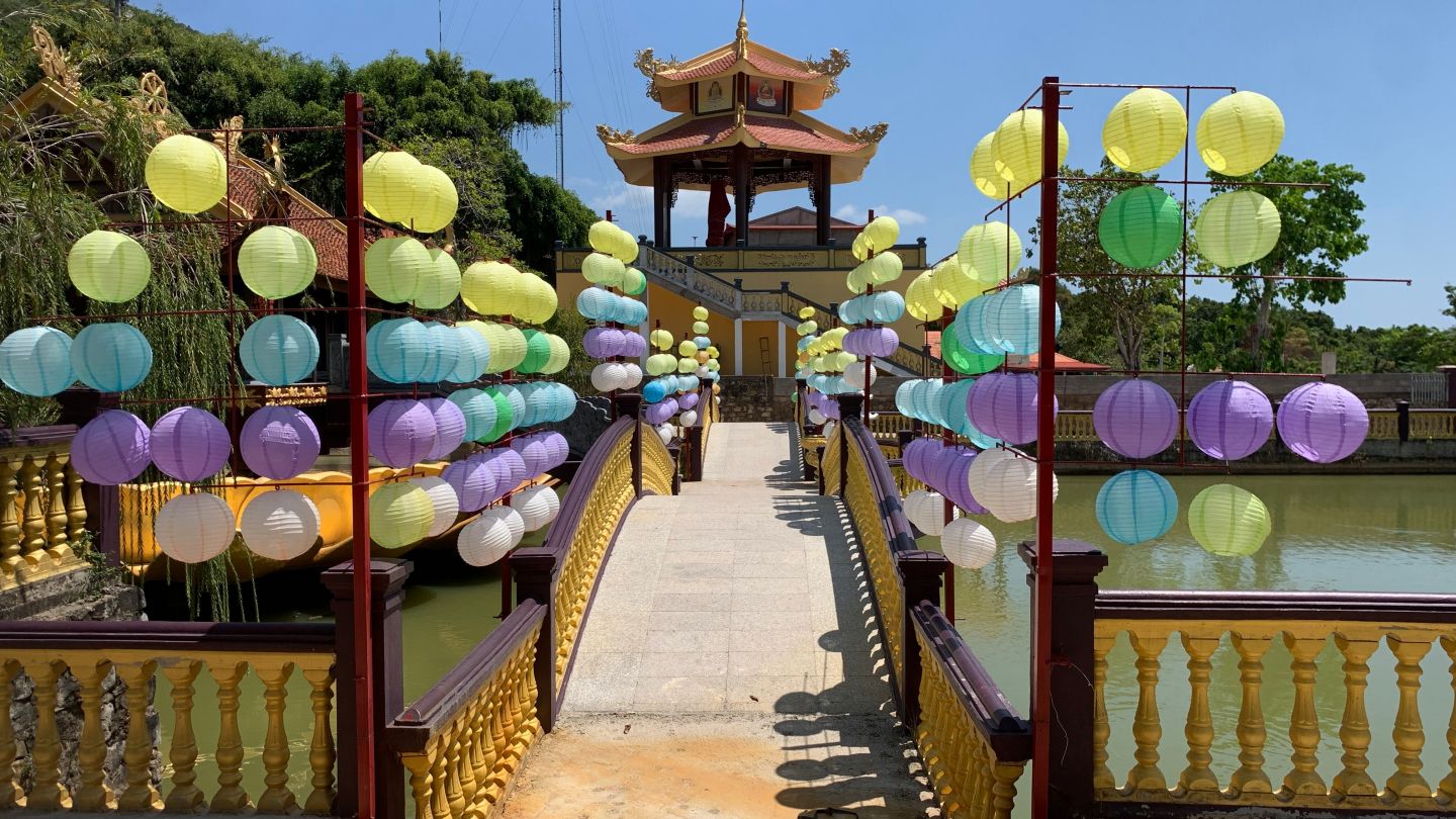 A bridge is decorated with colourful lantern