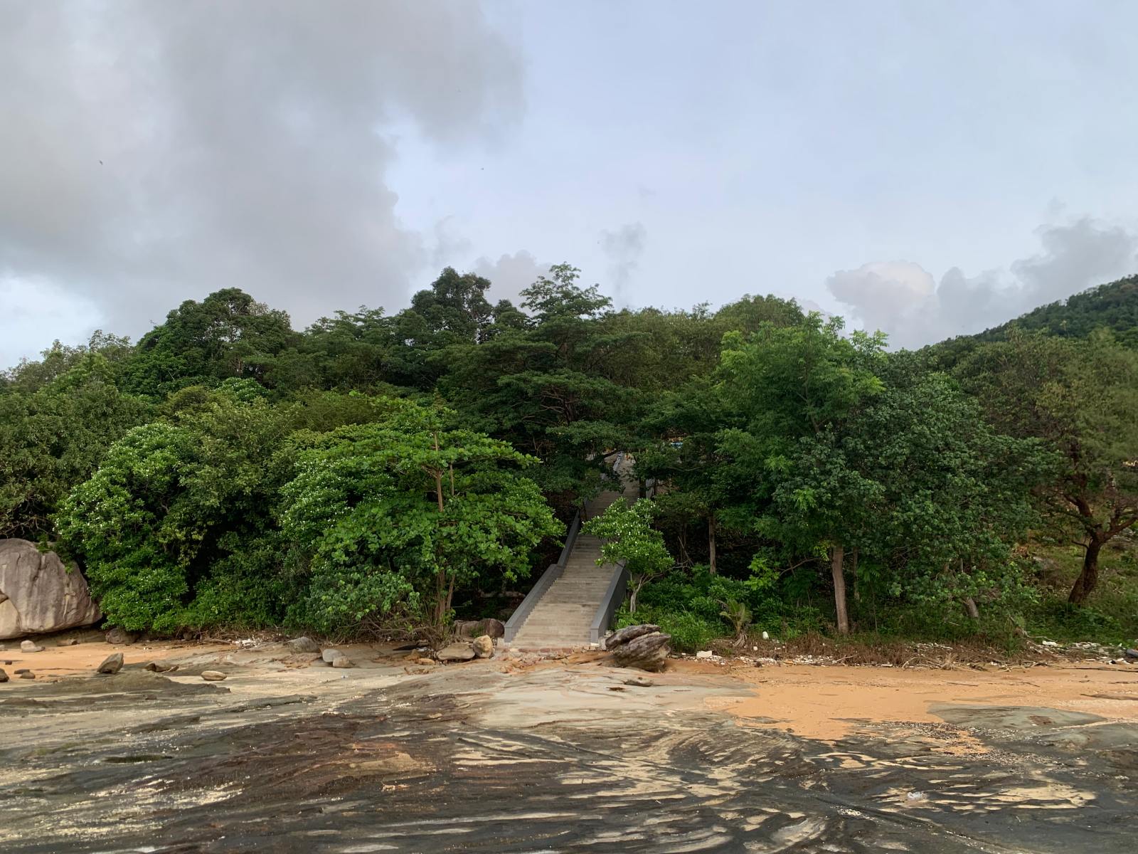 The Rock beach and trees under Phu Quoc Pagoda